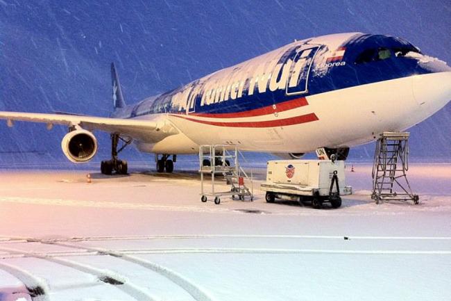 A340 in sneeuw in Parijs CDG